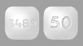 A rounded square chewable Vyvanse tablet with S489 on one side and 50 on the other