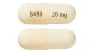 A white Vyvanse capsule with S489 and 20 mg printed on the side