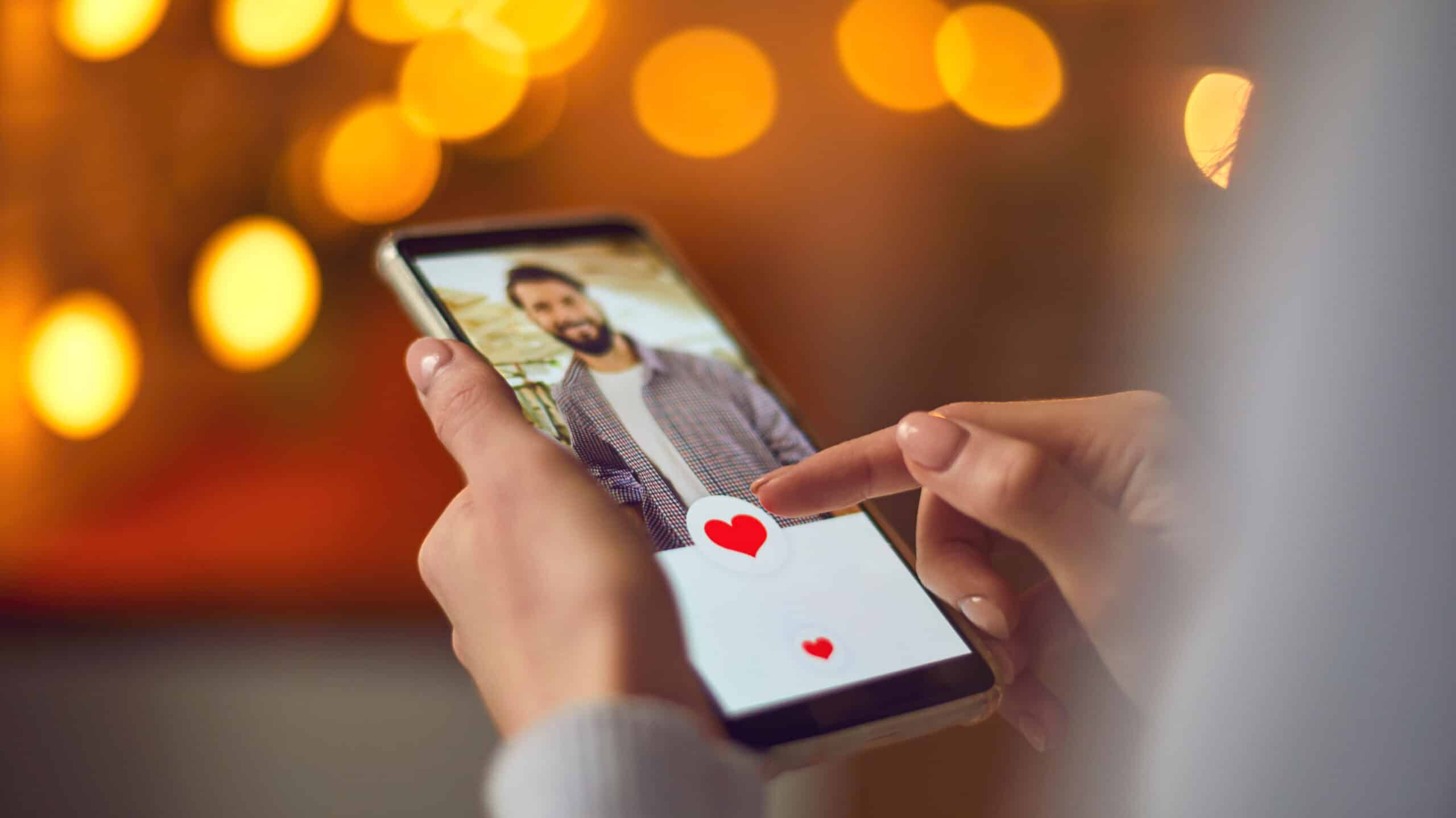 A woman "likes" a man's picture on a dating app - Can You Date In Rehab Relationships In Early Recovery